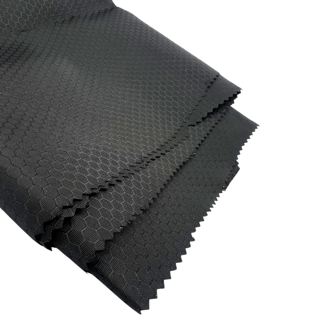 Vista frontal del rollo de tela Colmenita de poliéster de 50 metros